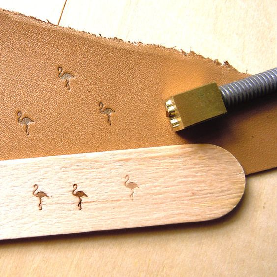 Custom leather branding heat stamp with brass head and handle for hot embossing logos on wallets, belts, bags, and vegetable-tanned leather crafts